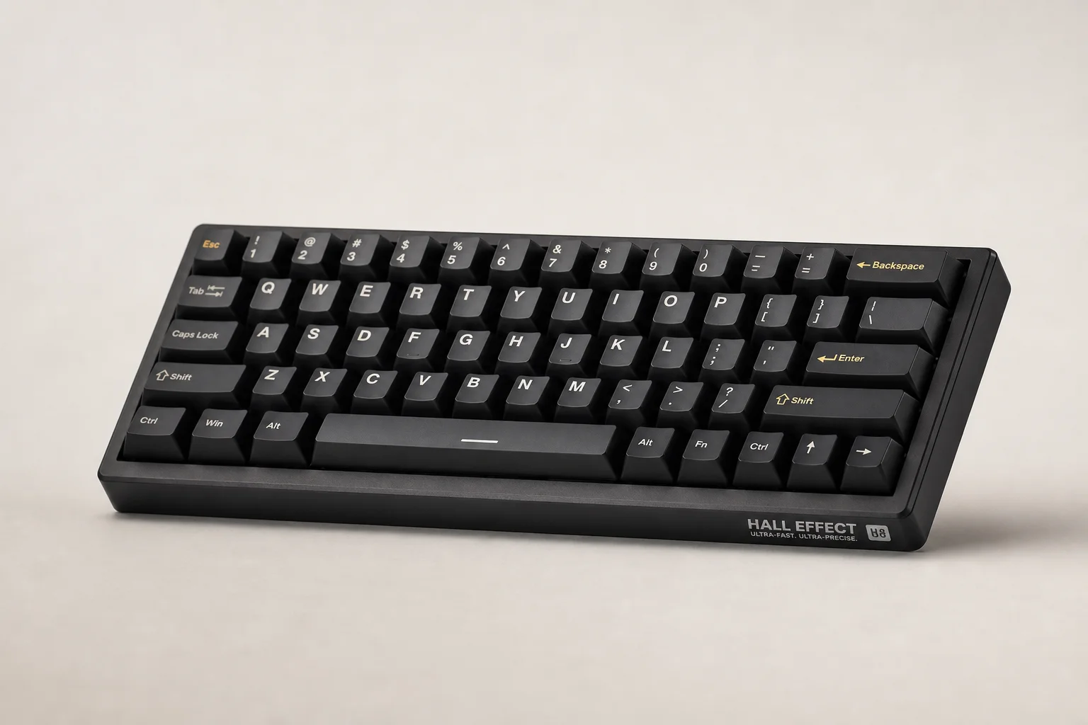 Modern compact gaming keyboard with matte black finish on brushed aluminium surface