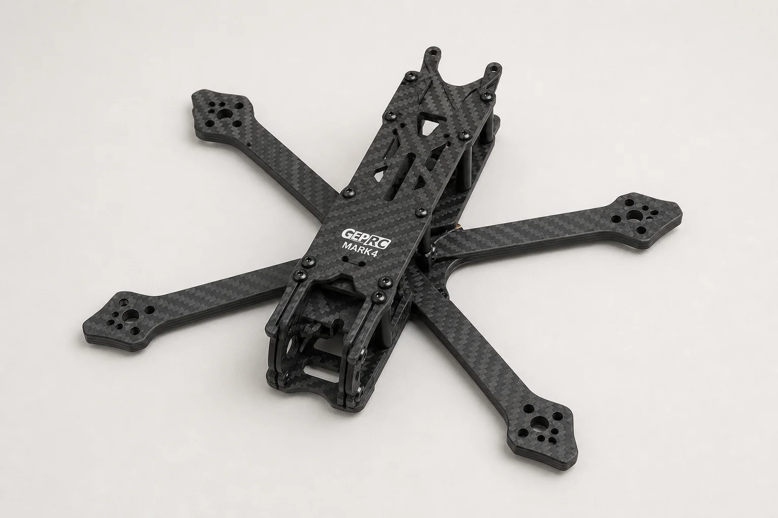 Fully assembled 7-inch FPV drone with all components mounted on concrete surface