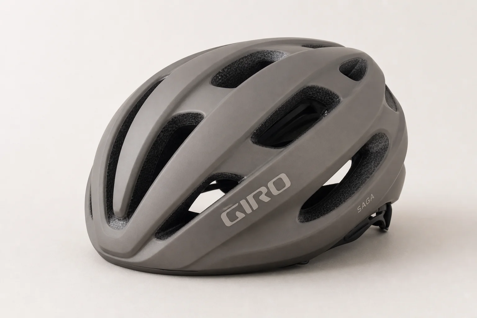 Three cycling helmets at different price points arranged side by side