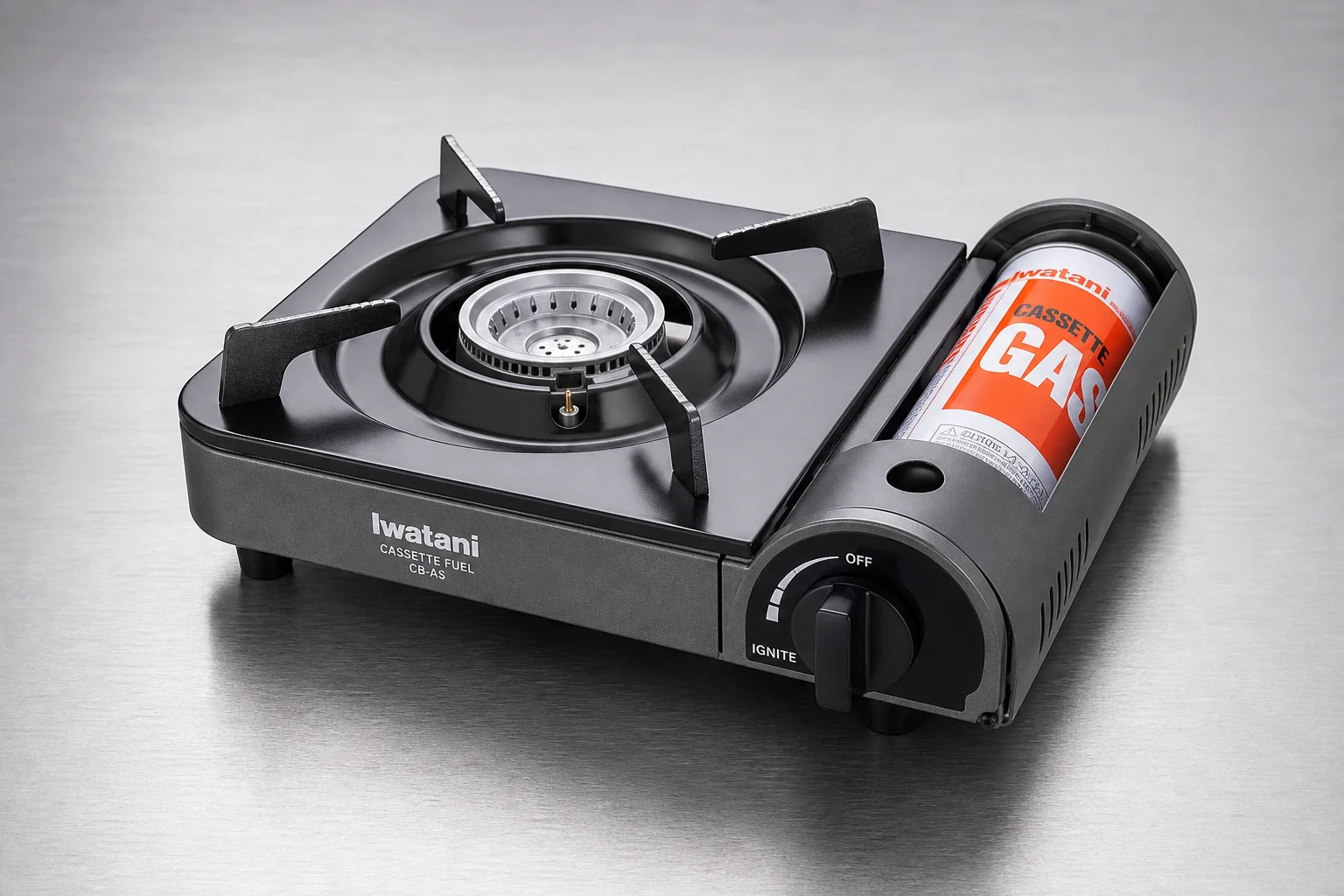 Three portable burners: electric, gas, and induction models on concrete surface