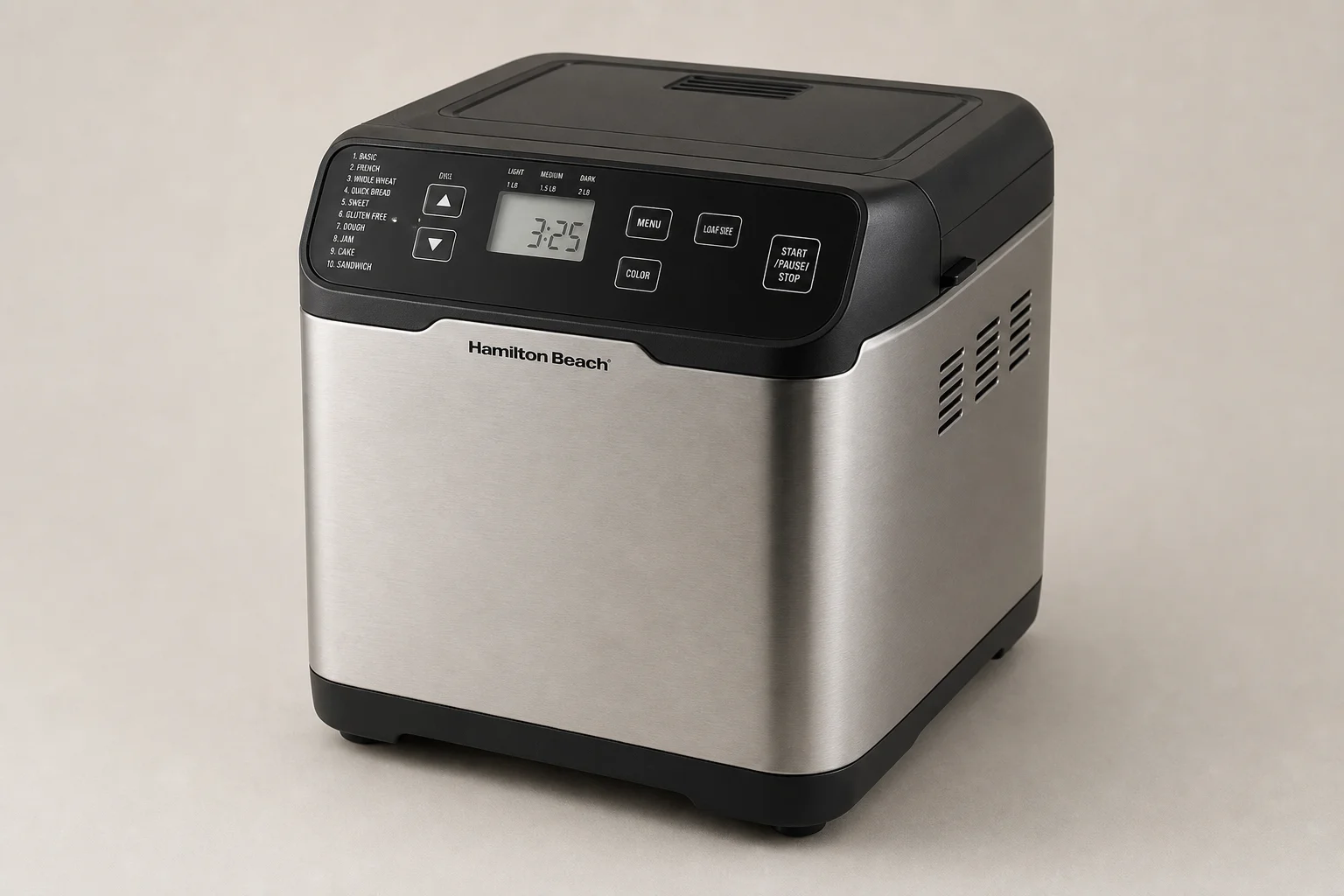 KitchenAid Classic Plus stand mixer and Zojirushi Supreme bread machine on concrete surface