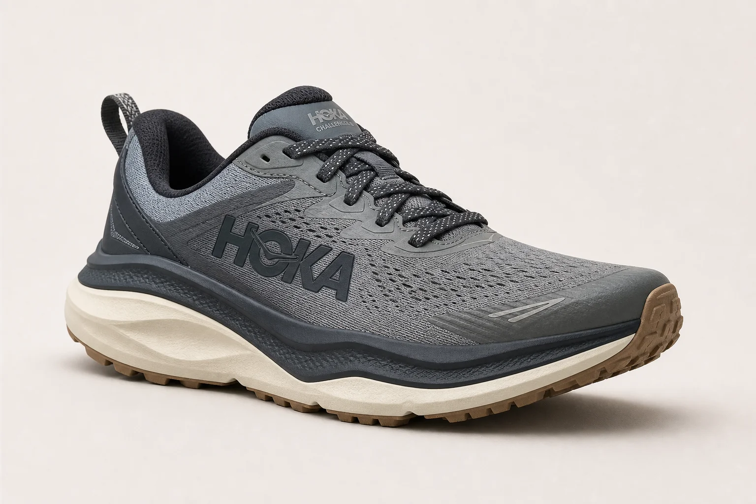 Eight cushioned trail running shoes arranged on concrete surface