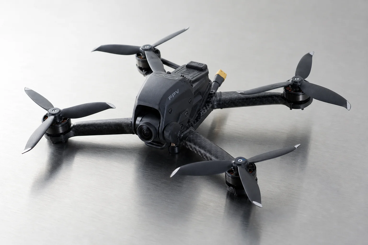 Five budget drones arranged on grey concrete surface