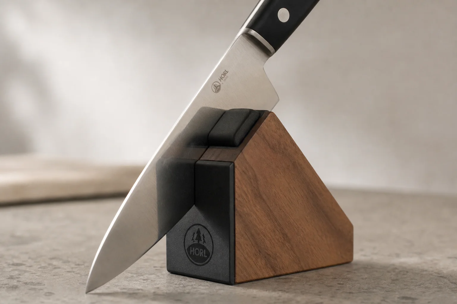 HORL magnetic angle support block securing a chef's knife during sharpening