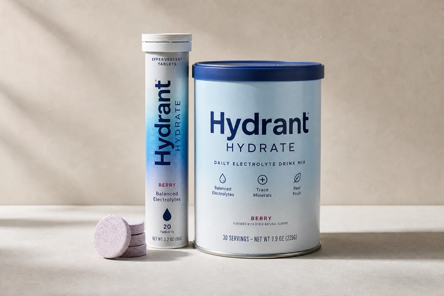 Collection of electrolyte products including powders, tablets, and tubs on concrete surface