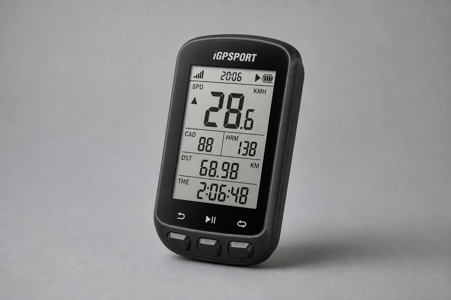 Collection of nine cycling accessories including wheels, lights, computer, watch, and clothing on concrete surface