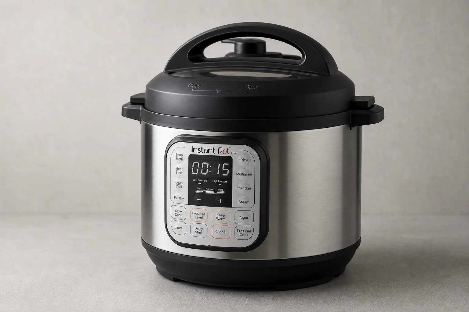 Instant Pot electric pressure cooker on grey surface