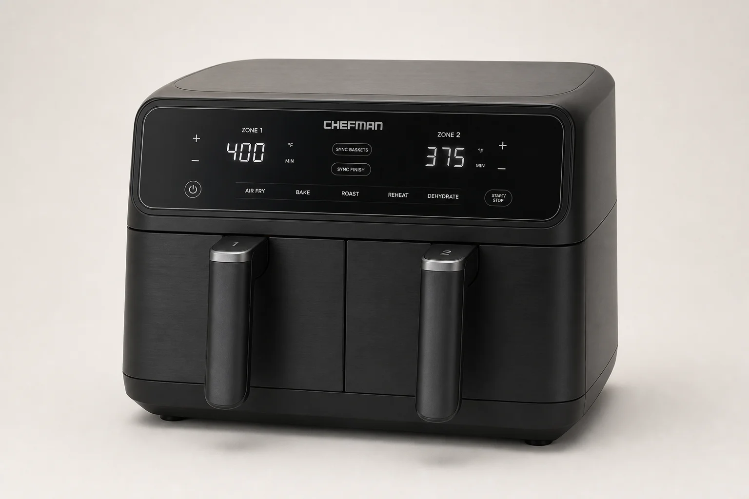 Six air fryer models arranged on concrete surface showing variety of styles and sizes