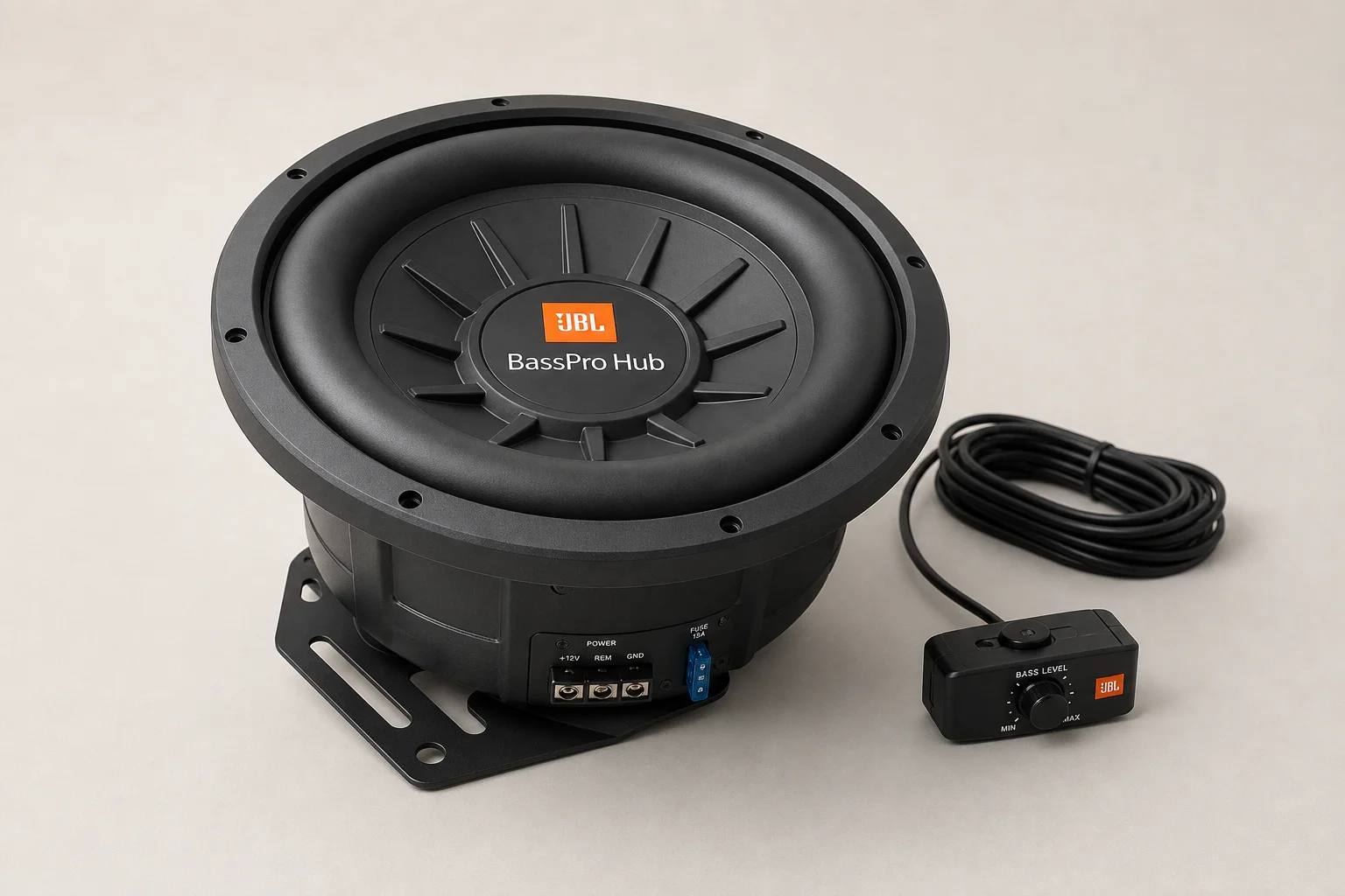 Seven car powered subwoofers of varying sizes arranged on grey surface