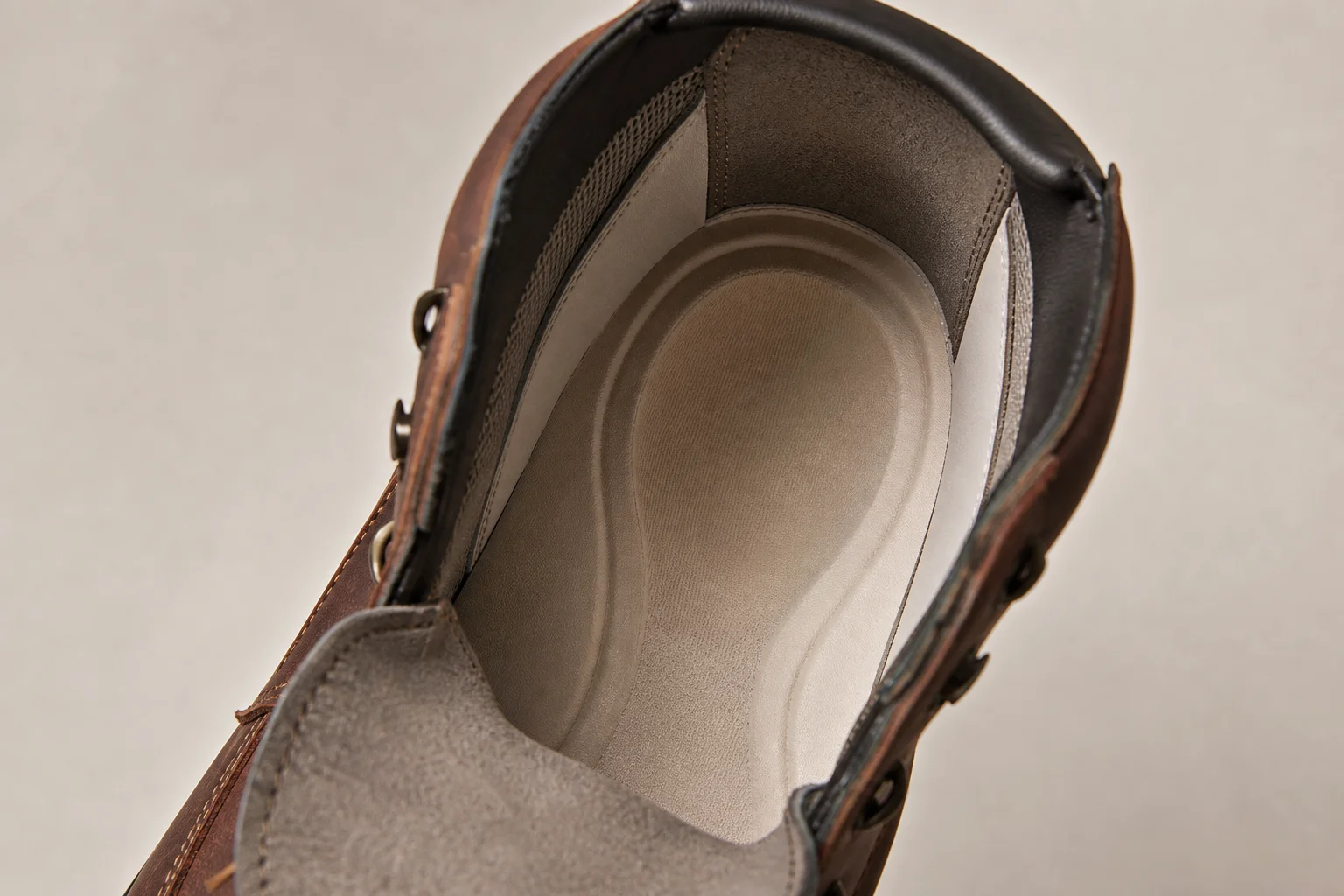 Boot insole and toe box interior showing anatomical shape and padding