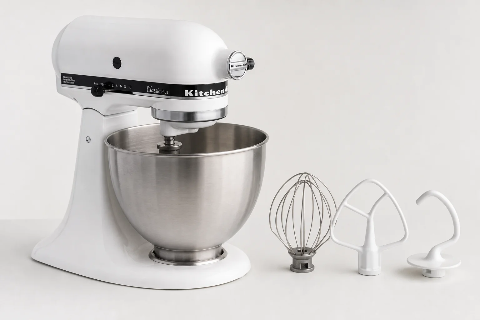 KitchenAid Classic Plus stand mixer and Zojirushi Supreme bread machine on concrete surface