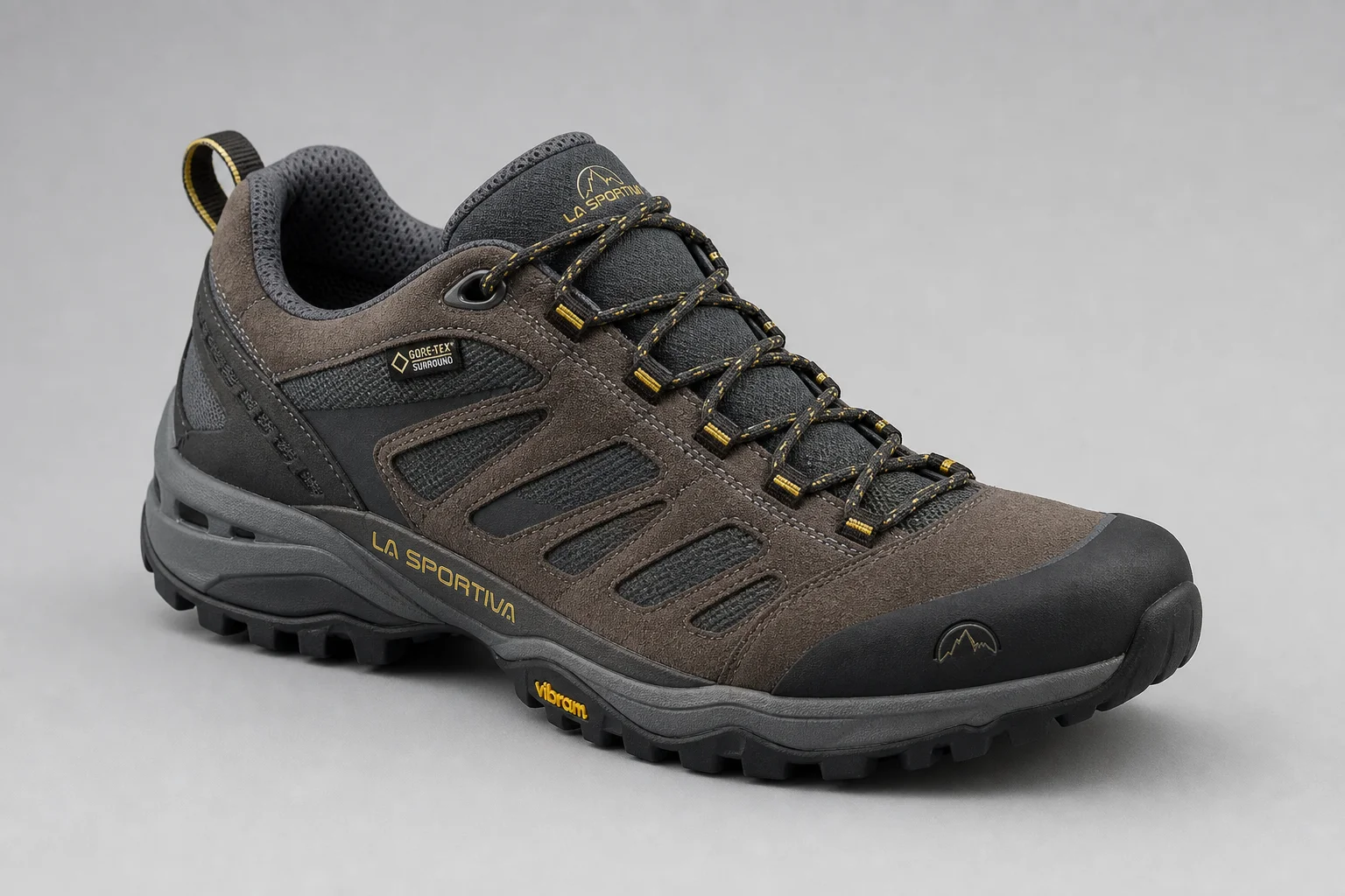 Five hiking shoes ranked and arranged on concrete surface