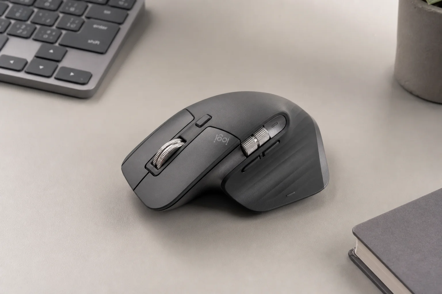 Logitech MX Master 3S mouse and MX Keys keyboard on a minimalist desk