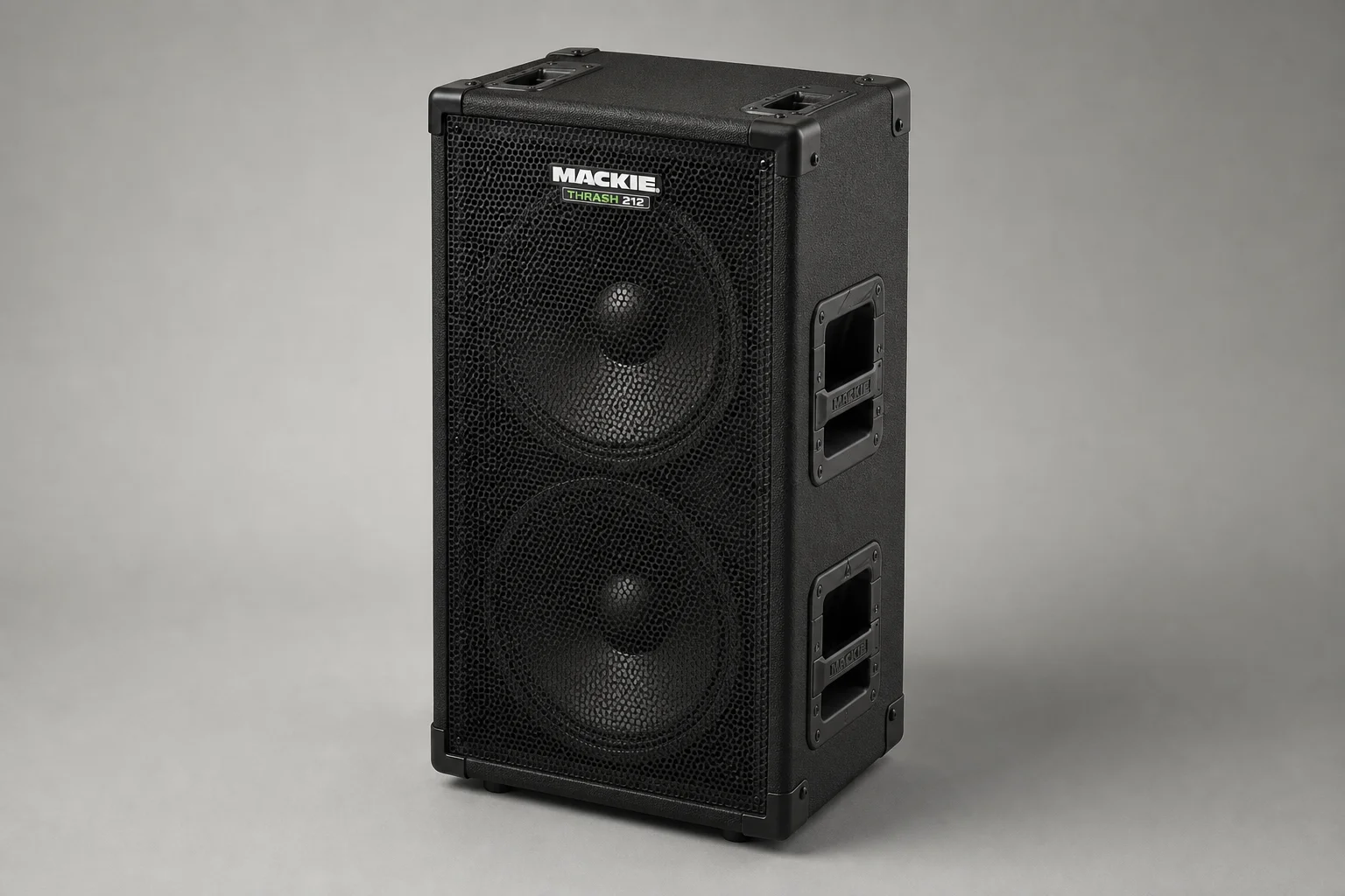 Four budget PA speakers lined up on concrete: Mackie Thrash 212, Alto TS410, JBL EON 610, Yamaha DBR10