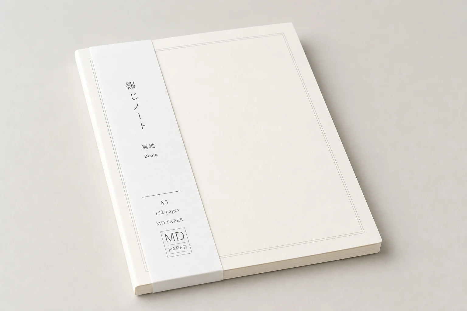 Flat-lay arrangement of 12 essential travel items on grey concrete surface