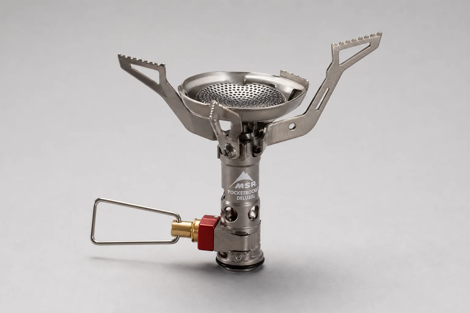 MSR Pocket Rocket Deluxe with Fire Maple Petrel G2 and Soto Windmaster with Fire Maple Petrel G3 stove systems on concrete