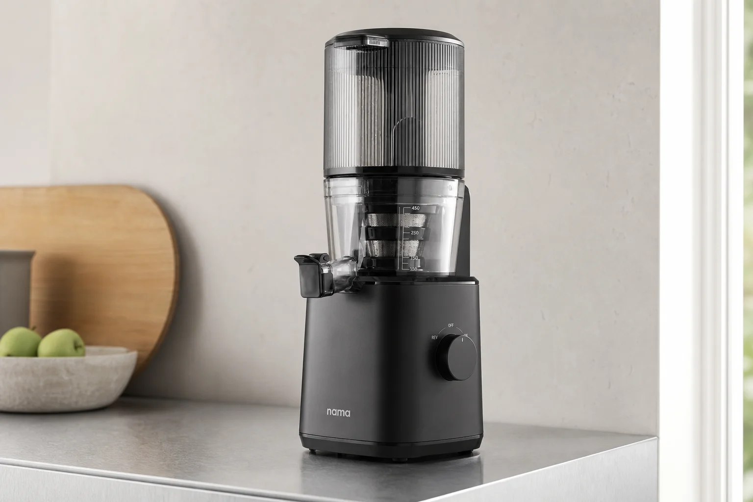 Four cold press juicers lined up on concrete: Hurom H70, H400, Nama J2, and Kuvings AUTO10