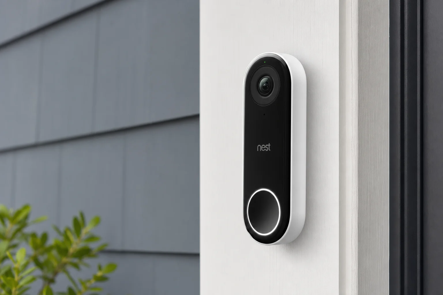 Smart home devices including thermostat, doorbell, lock, bulb, and hub on concrete