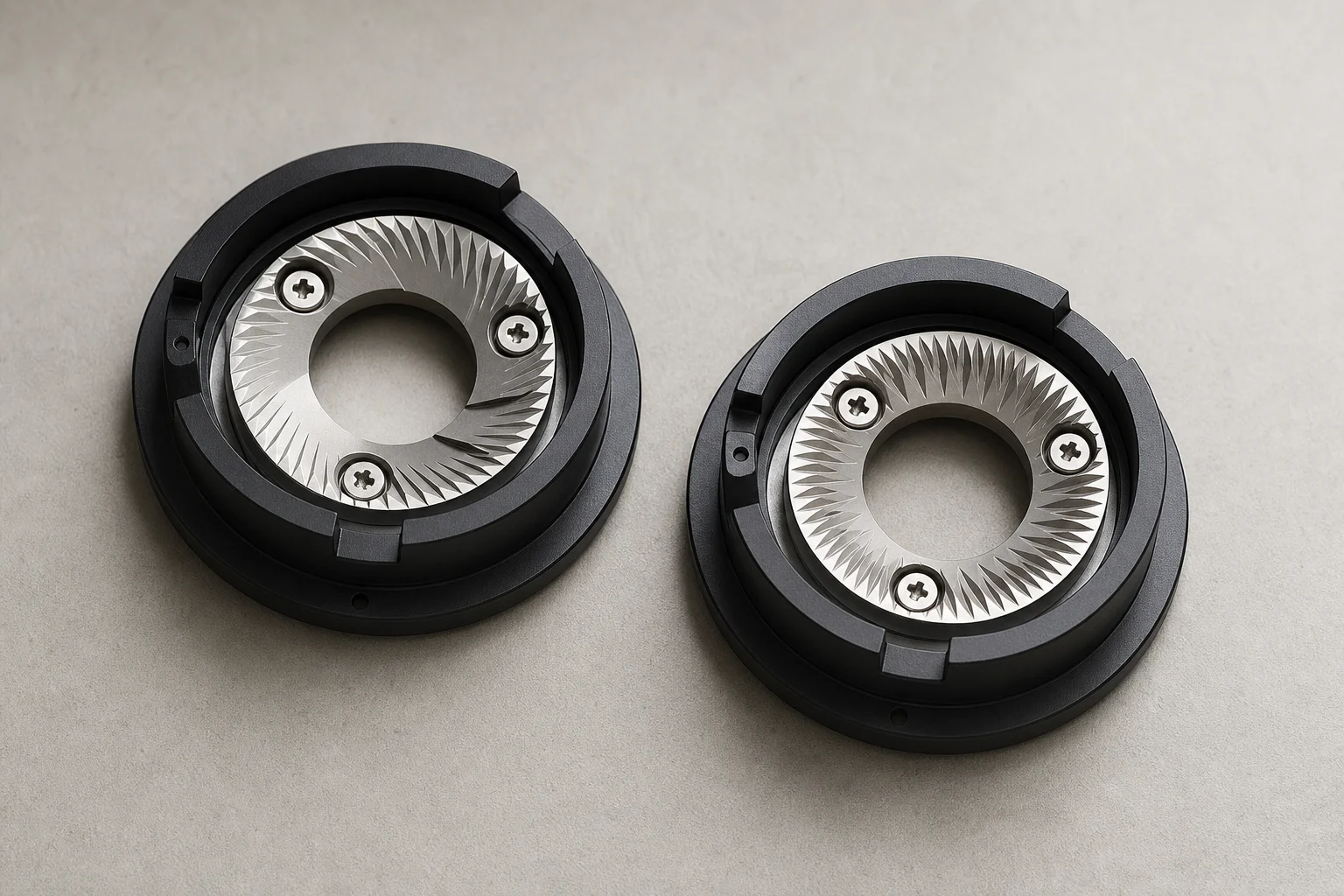 Two burr carrier sets side by side showing espresso and filter designs