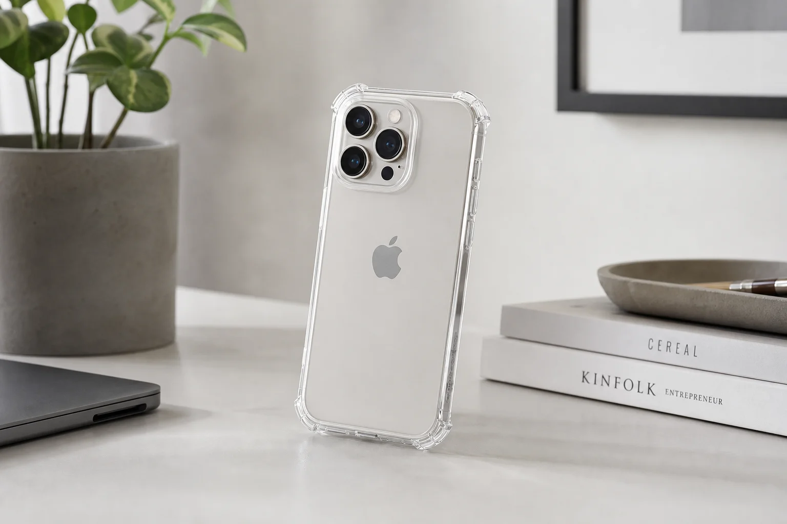 Smartphone in protective case positioned on desk with soft ambient lighting