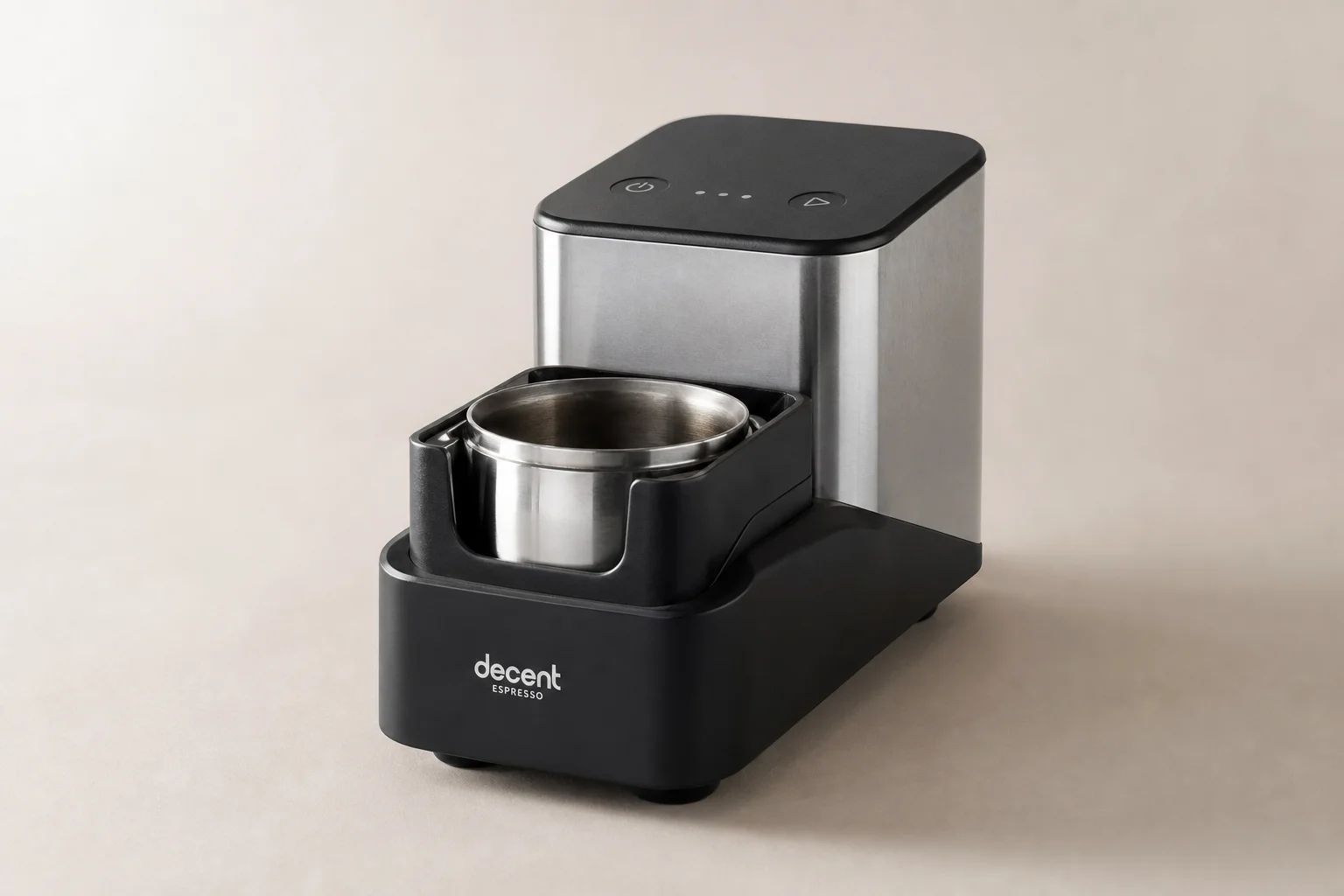 Espresso puck prep tools arranged on brushed steel surface