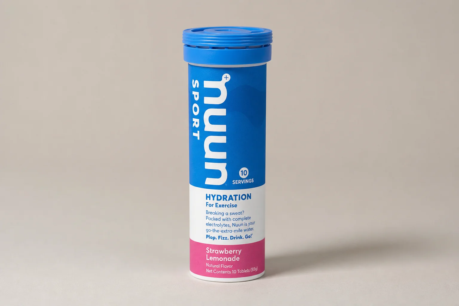 Collection of electrolyte products including powders, tablets, and tubs on concrete surface