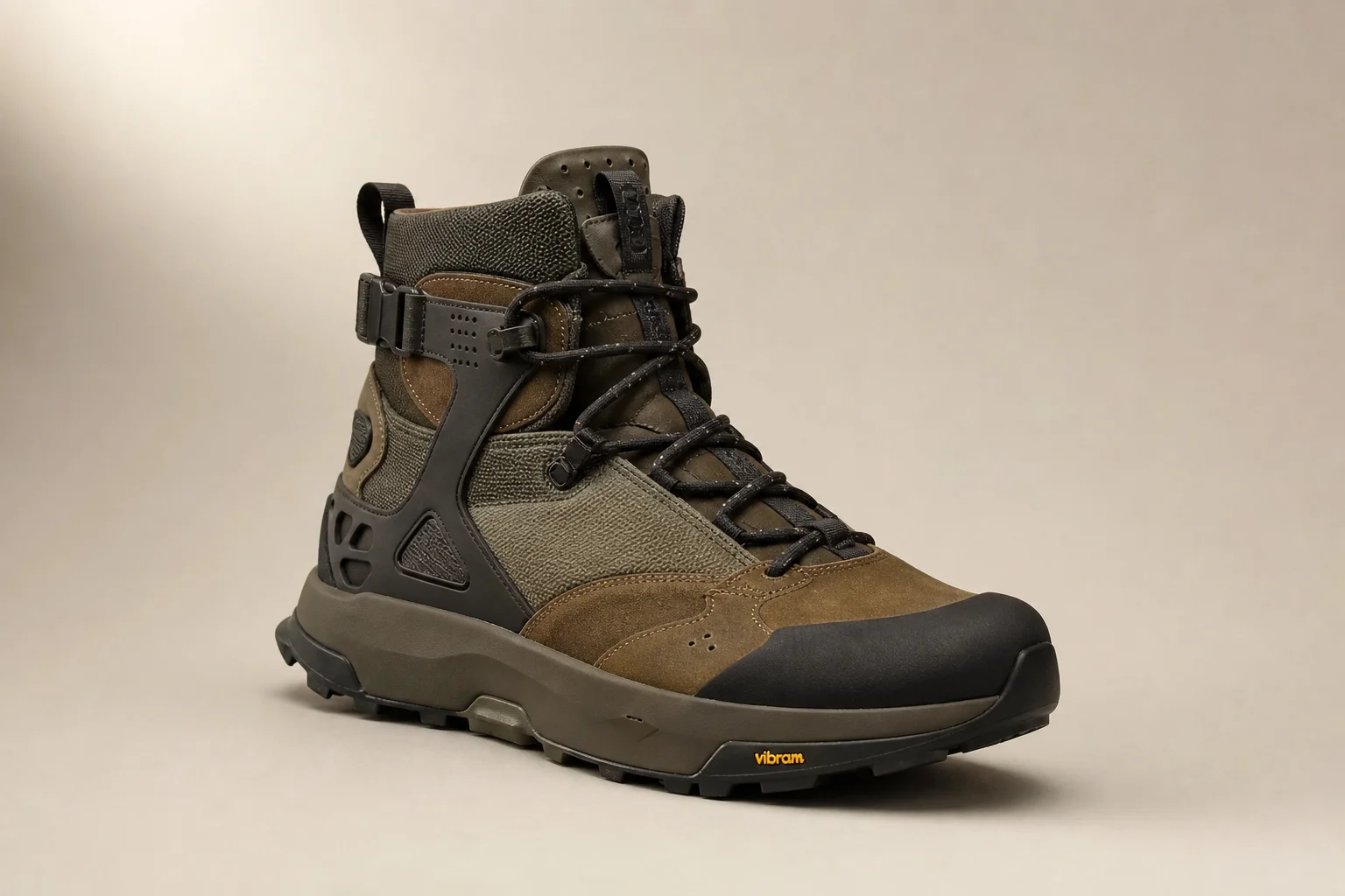 Collection of diverse winter boots arranged on concrete surface