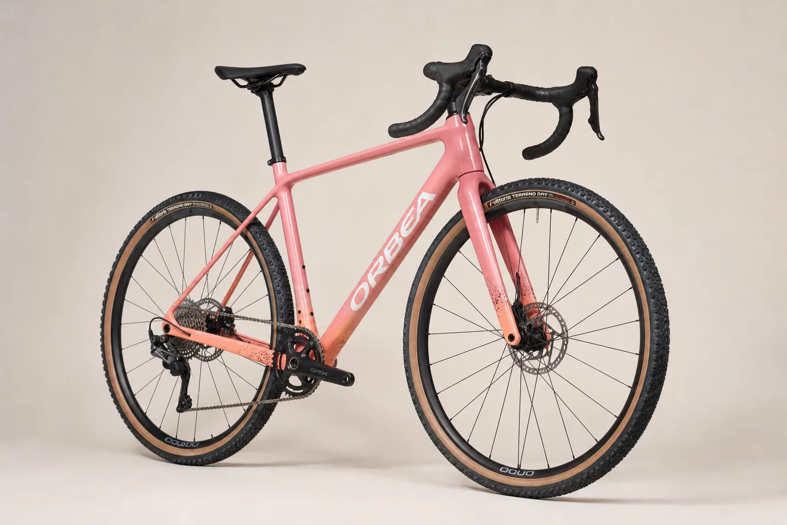 Multiple allroad bikes displayed on neutral backdrop showing different frame materials and designs