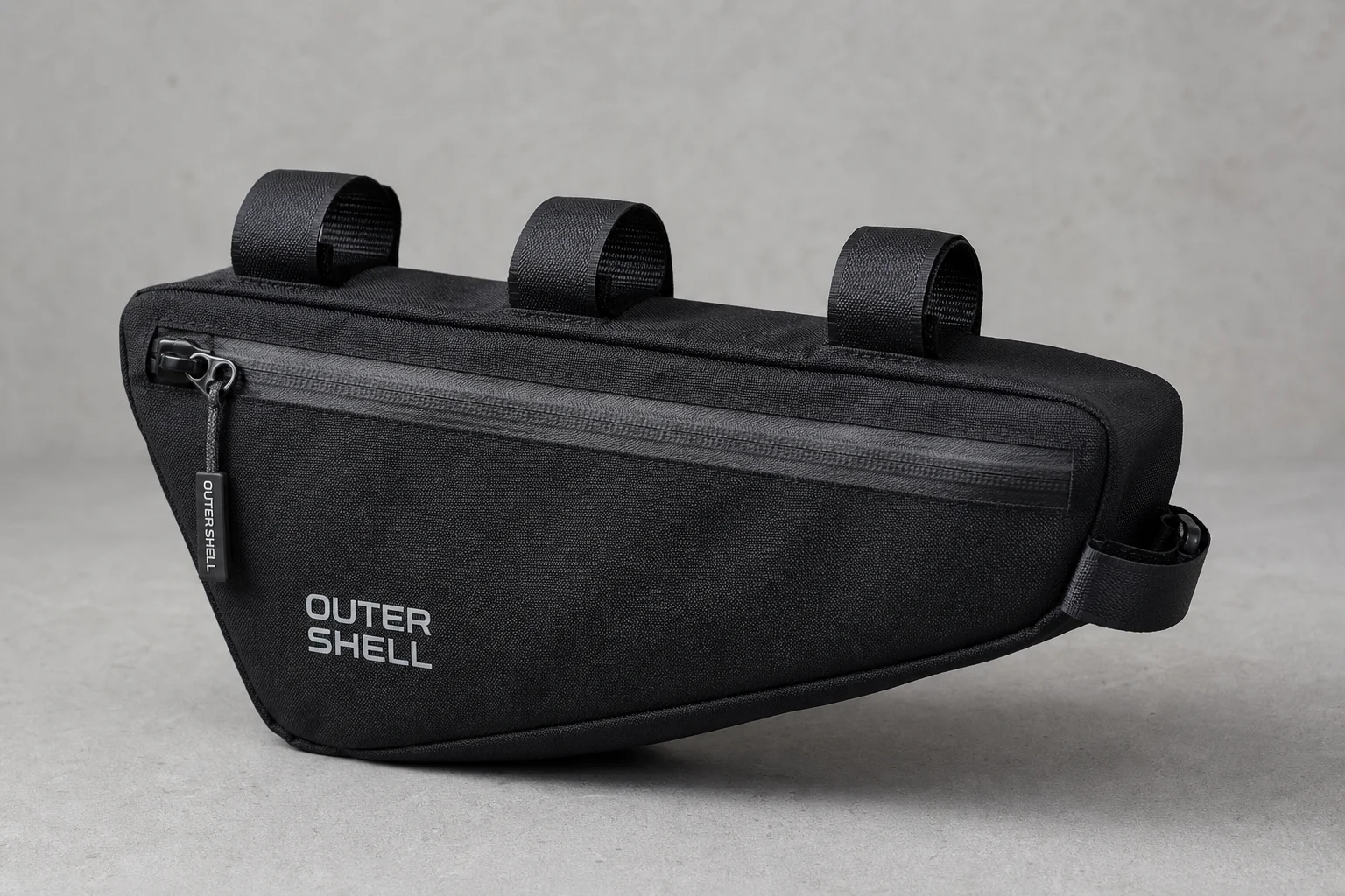 Black frame bag with sturdy construction and defined shape on neutral surface