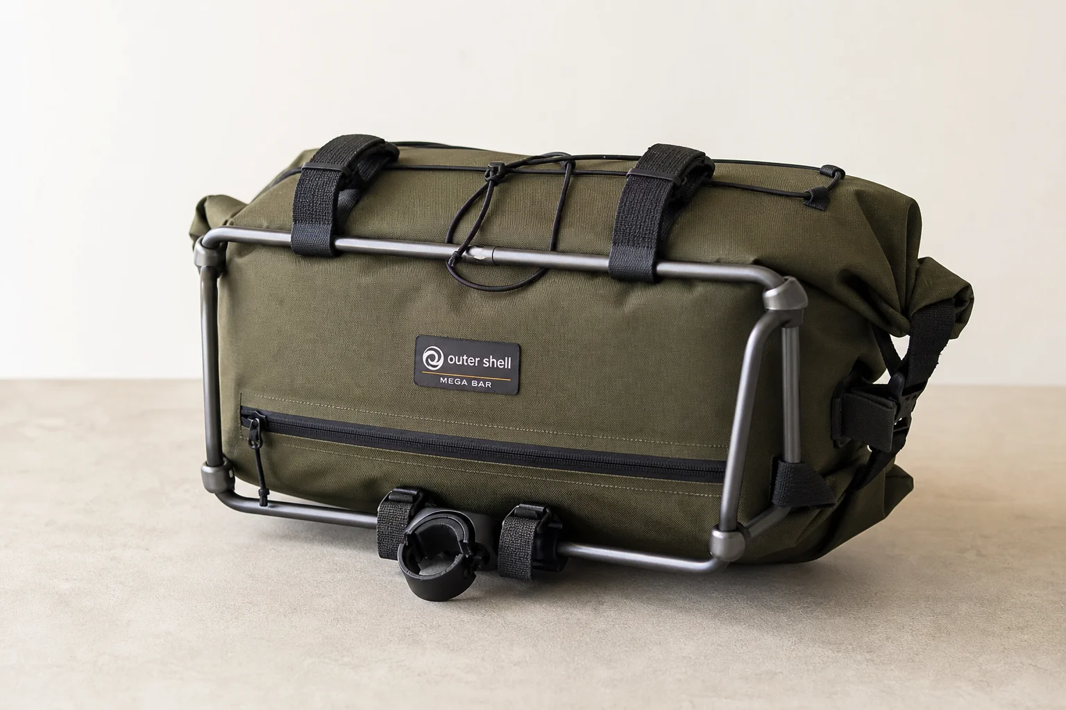 Six Outer Shell bike packing bags in various colors and sizes on neutral backdrop