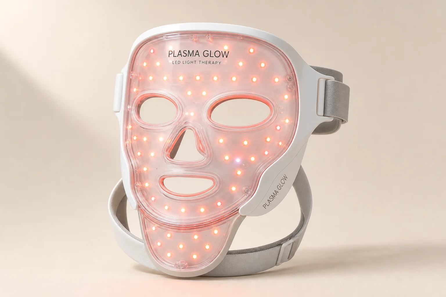 配備整合式下巴綁帶的 Plasma Glow LED 面罩，置於中性背景前