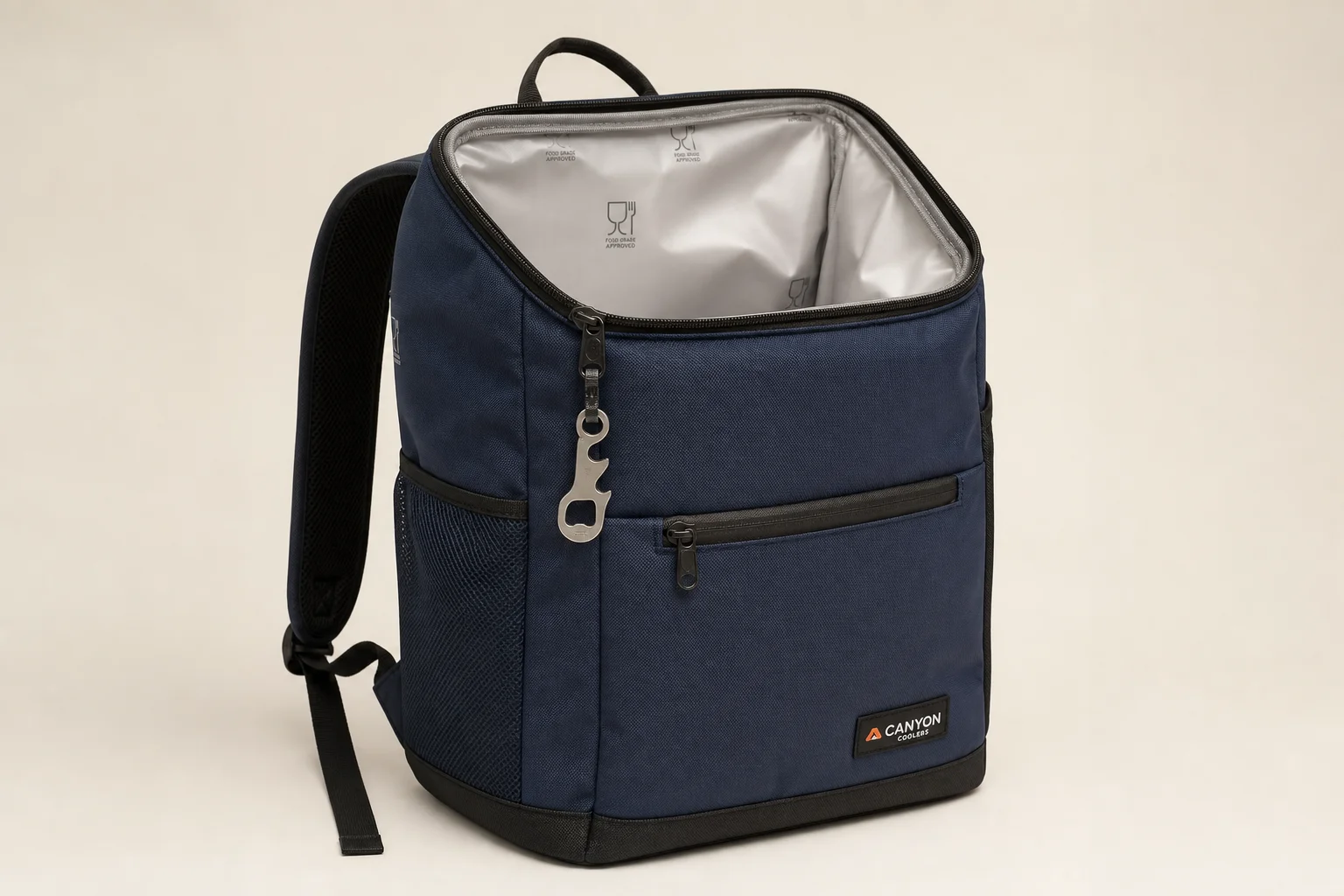 Five cooler backpacks in various styles arranged on concrete surface