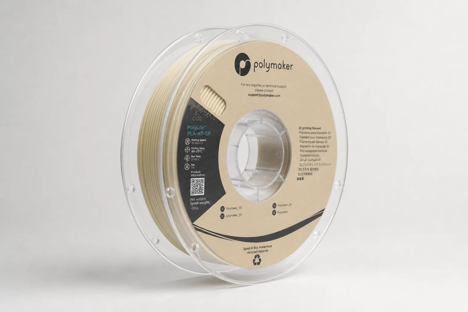 Collection de diverses bobines de filament pour imprimante 3D sur une surface en béton