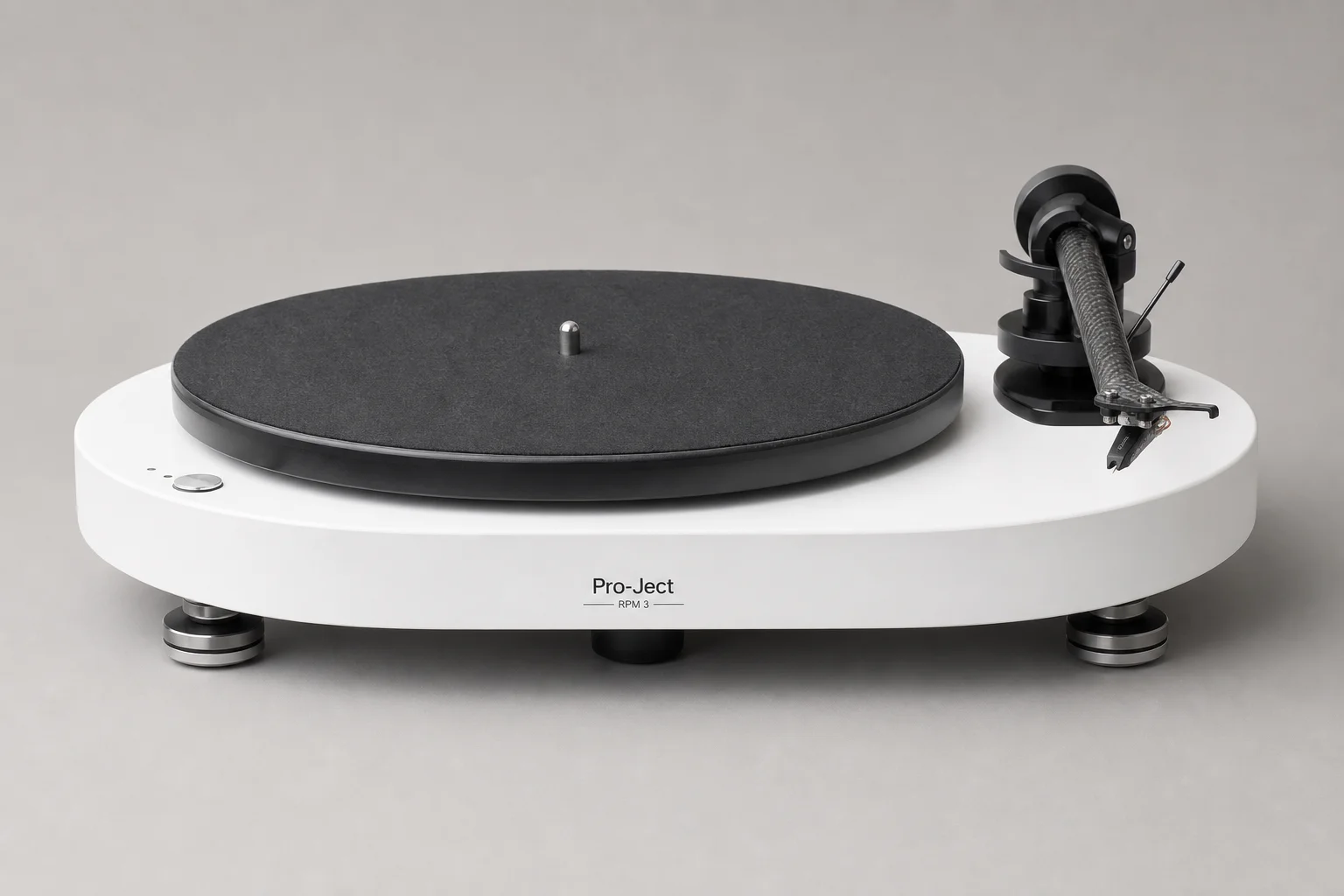 Six turntables displayed on concrete surface showing variety of designs and finishes