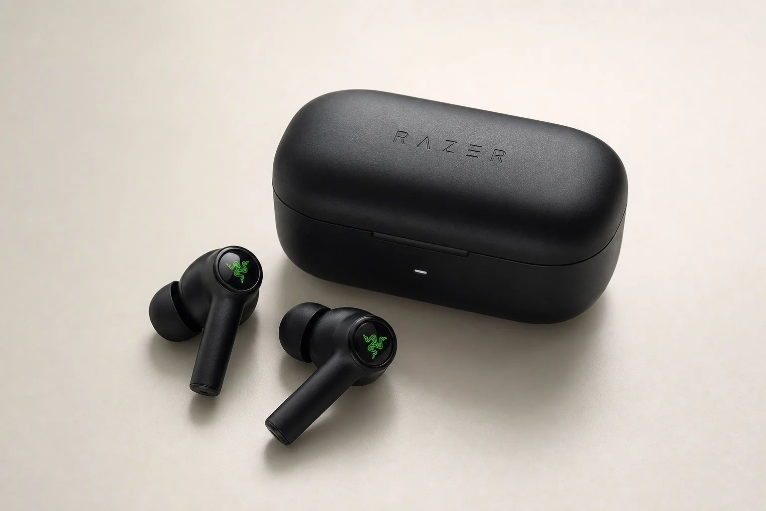 Collection of 12 true wireless earbuds arranged on concrete surface