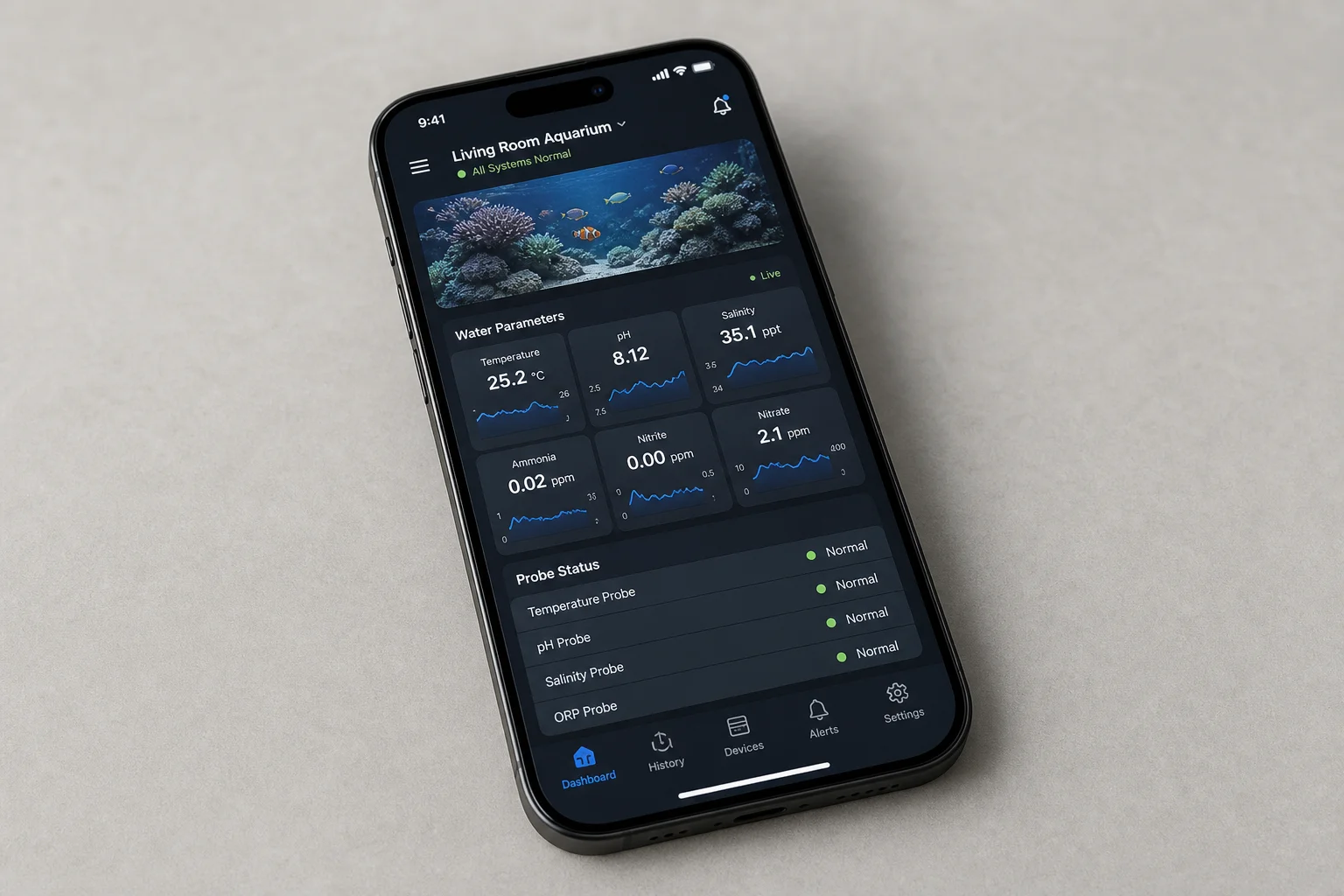Mobile phone displaying aquarium monitoring app with probe data