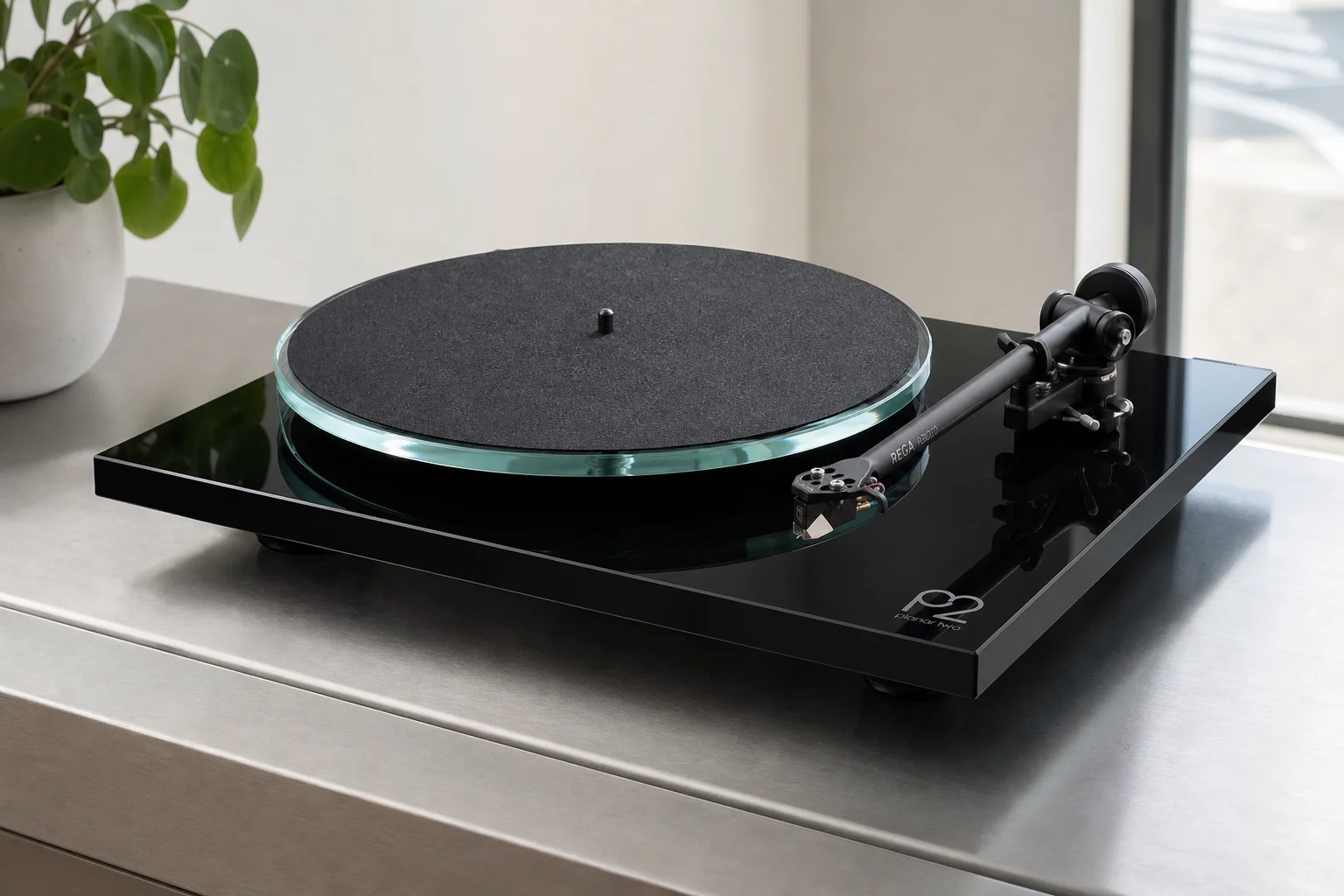Six turntables displayed on concrete surface showing variety of designs and finishes