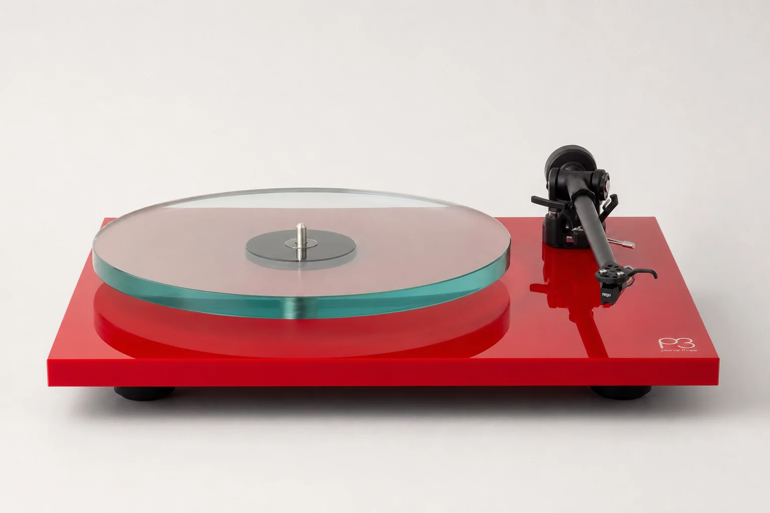 Six turntables displayed on concrete surface showing variety of designs and finishes