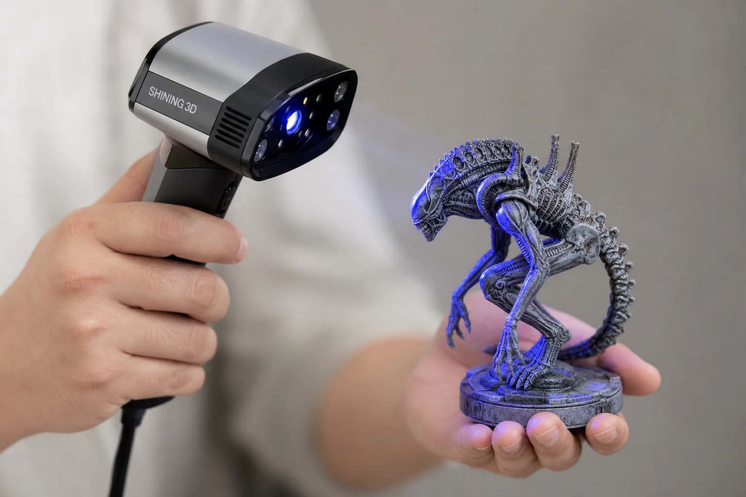 Close-up of 3D scanner capturing fine details on a small decorative object