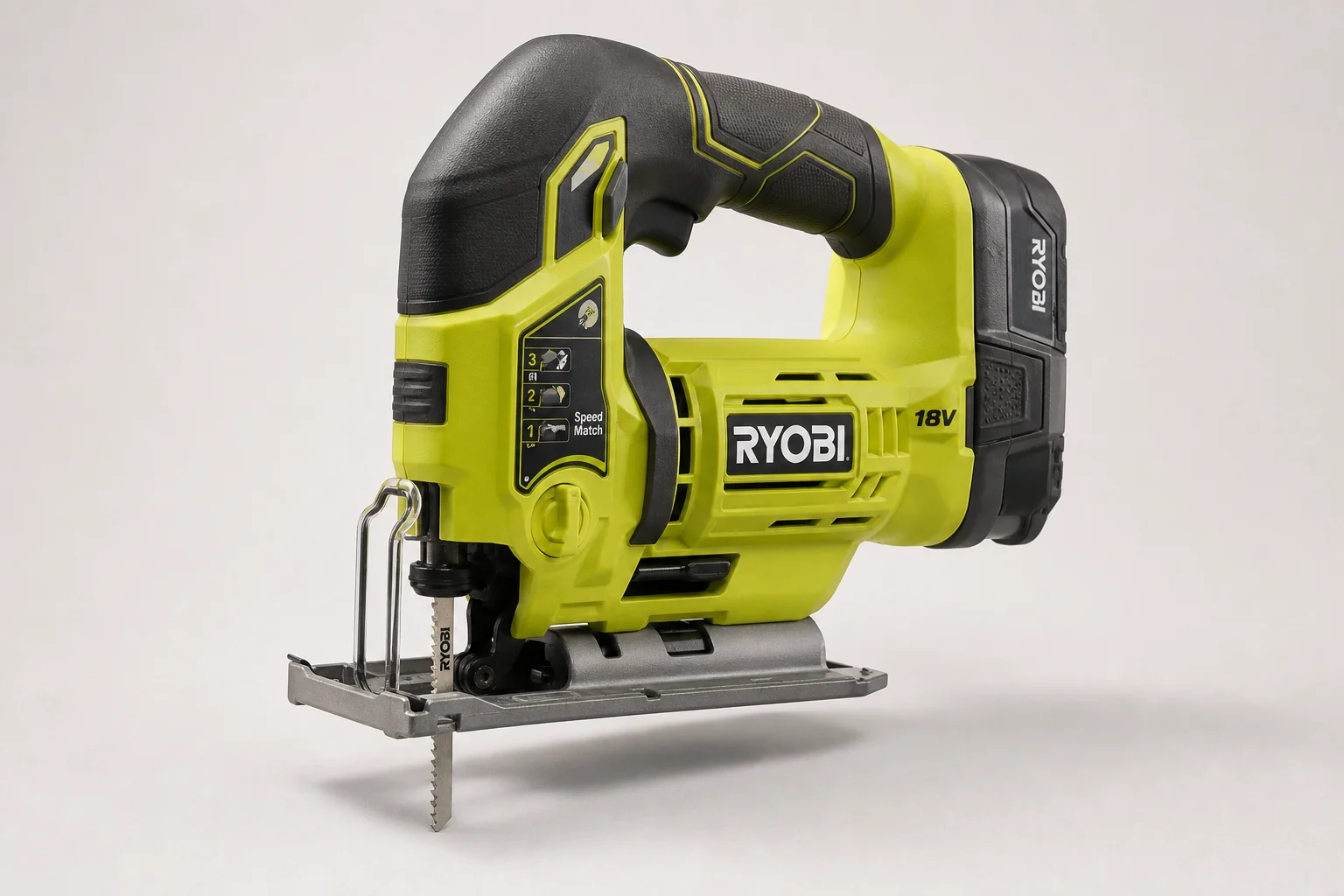 Ryobi 18V One+ cordless tools arranged on concrete surface