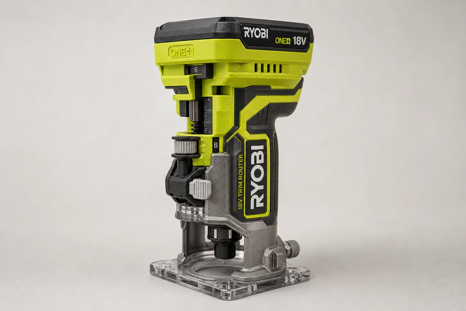 Ryobi 18V One+ cordless tools arranged on concrete surface
