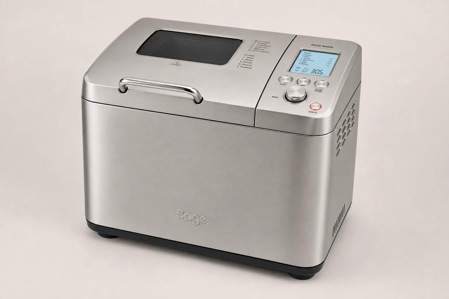 Five bread maker machines arranged on a wooden surface in various sizes and finishes
