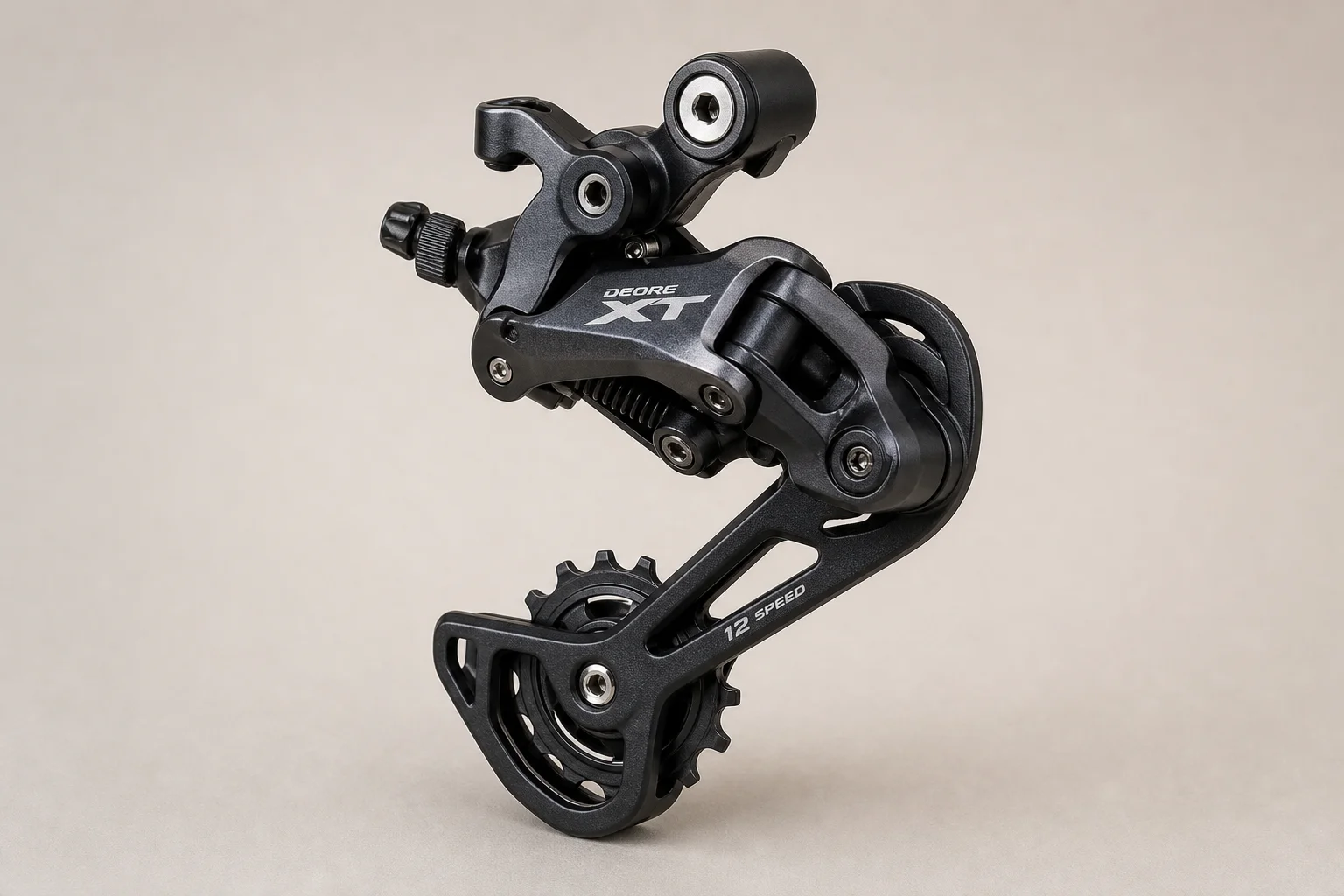 Fully loaded hardtail mountain bike with bikepacking gear on neutral backdrop