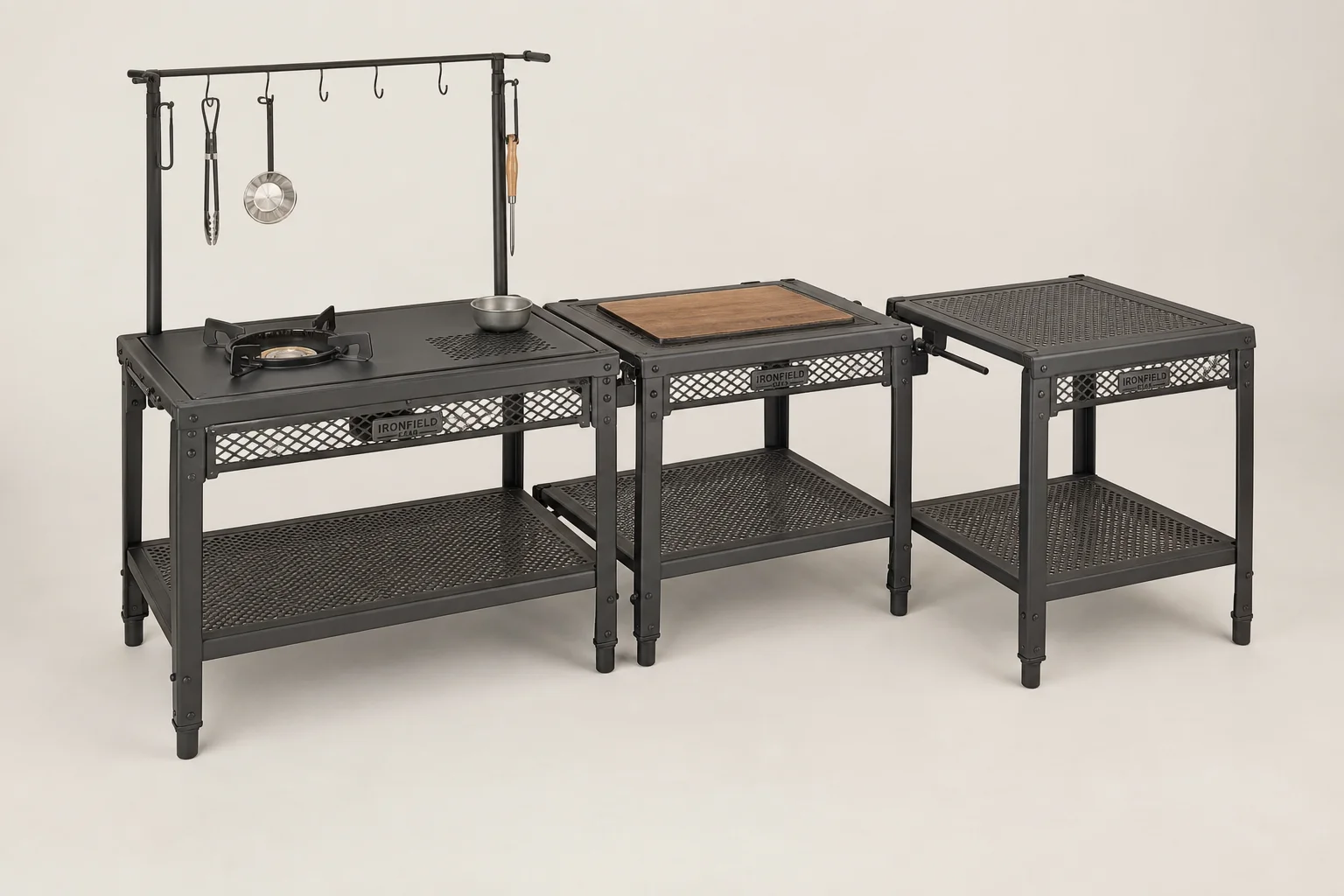 Camping kitchen setup with portable table, cooler, and cooking equipment
