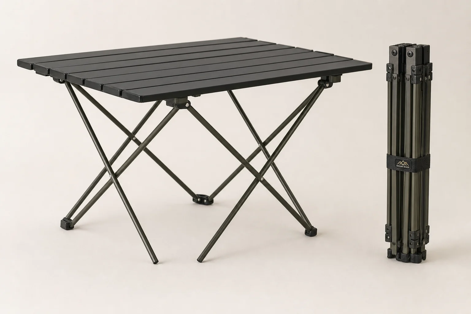 Camping kitchen setup with portable table, cooler, and cooking equipment