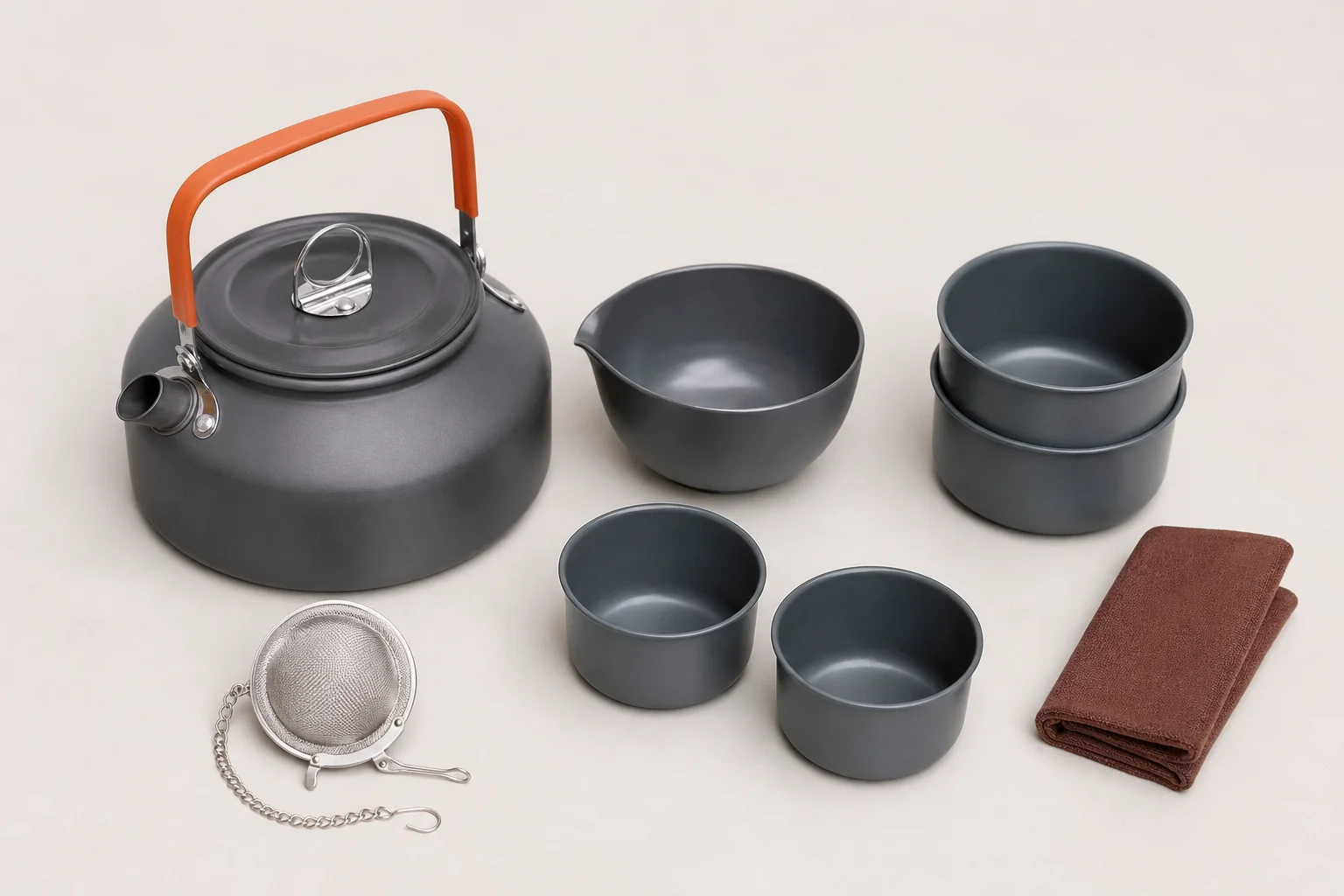 Camping kitchen setup with portable table, cooler, and cooking equipment
