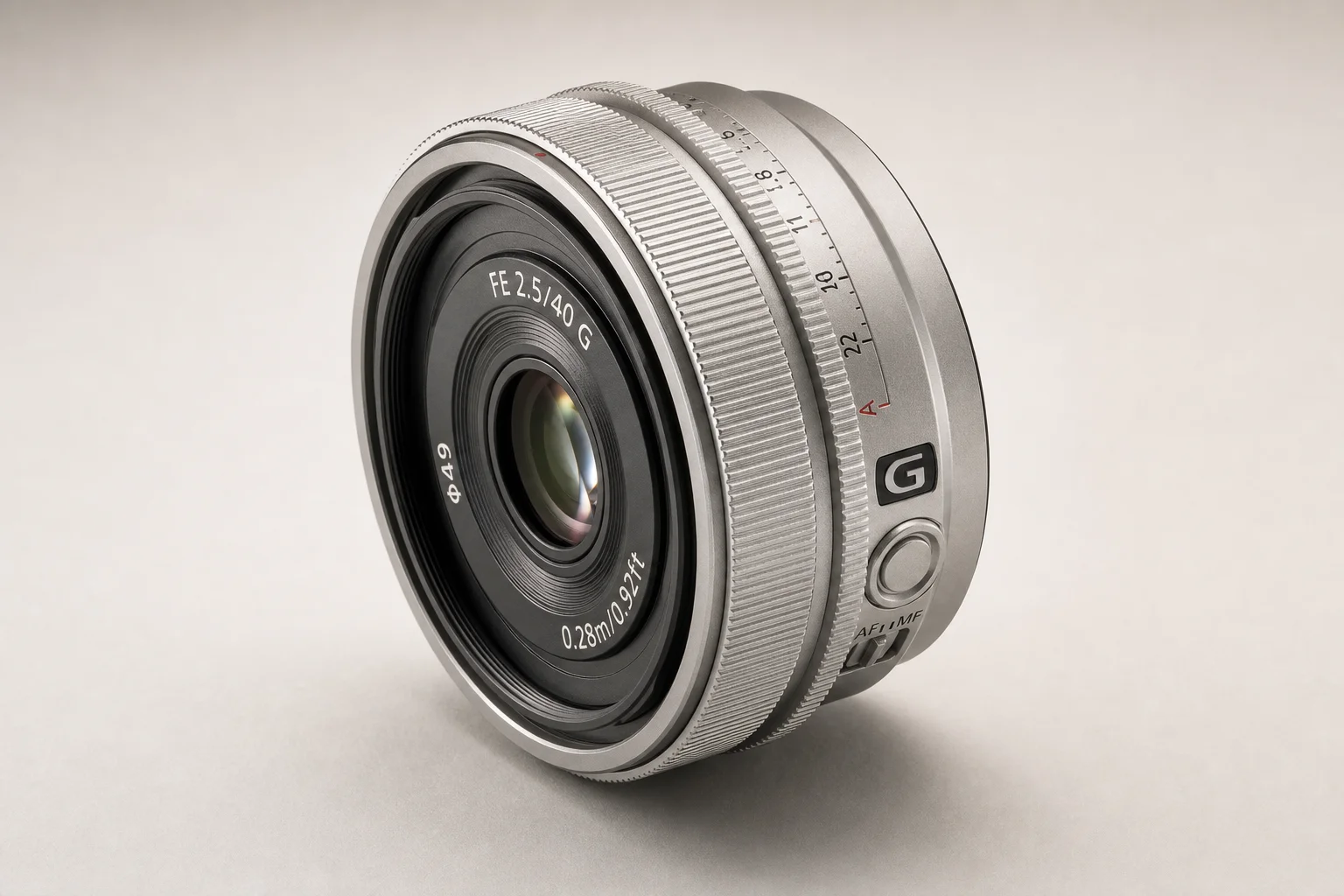 Complete street photography camera setup with Sony A7CR, lens, hood, strap, and accessories on brushed metal surface