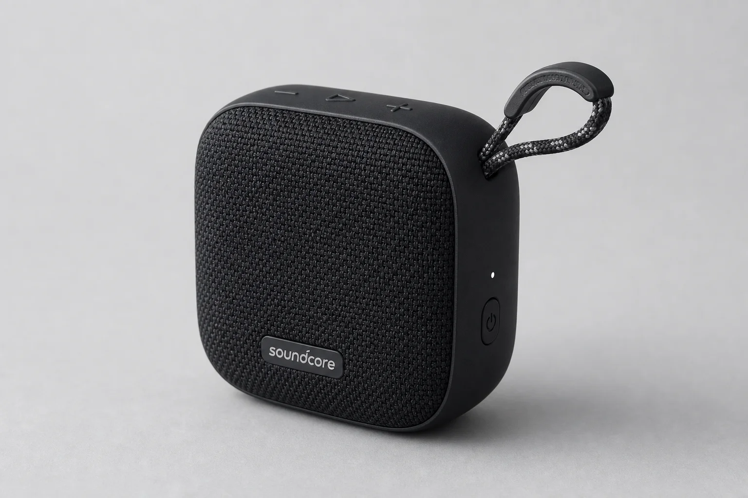 Five Sony Bluetooth speakers arranged on concrete surface