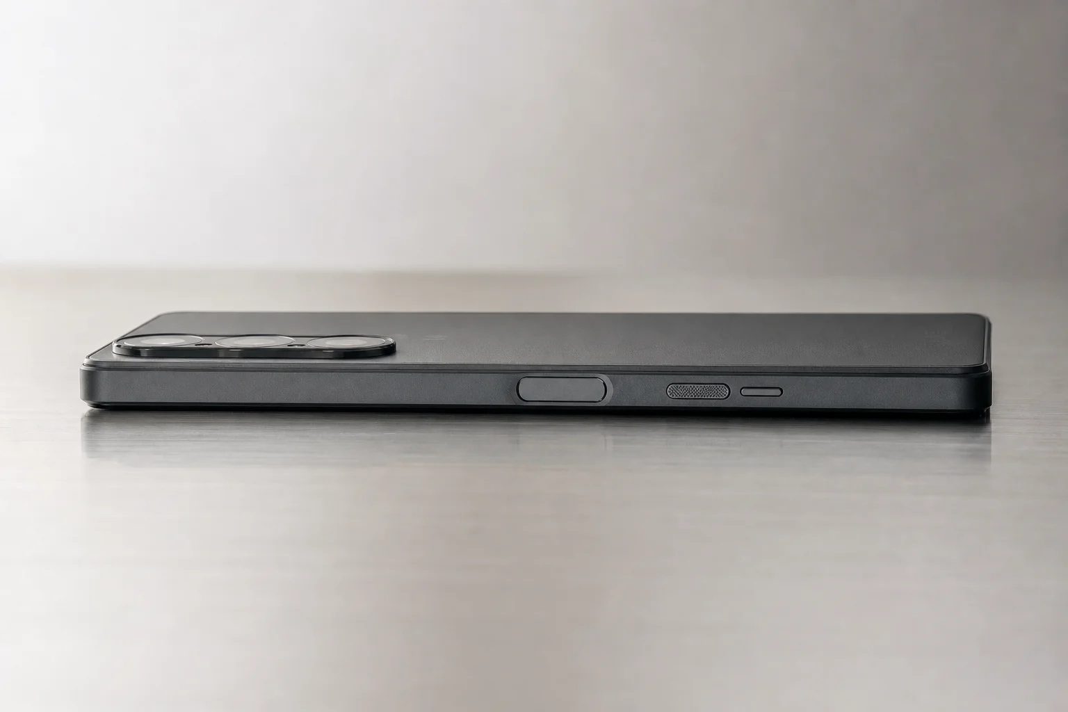Smartphone side profile showing physical buttons and eSIM slot