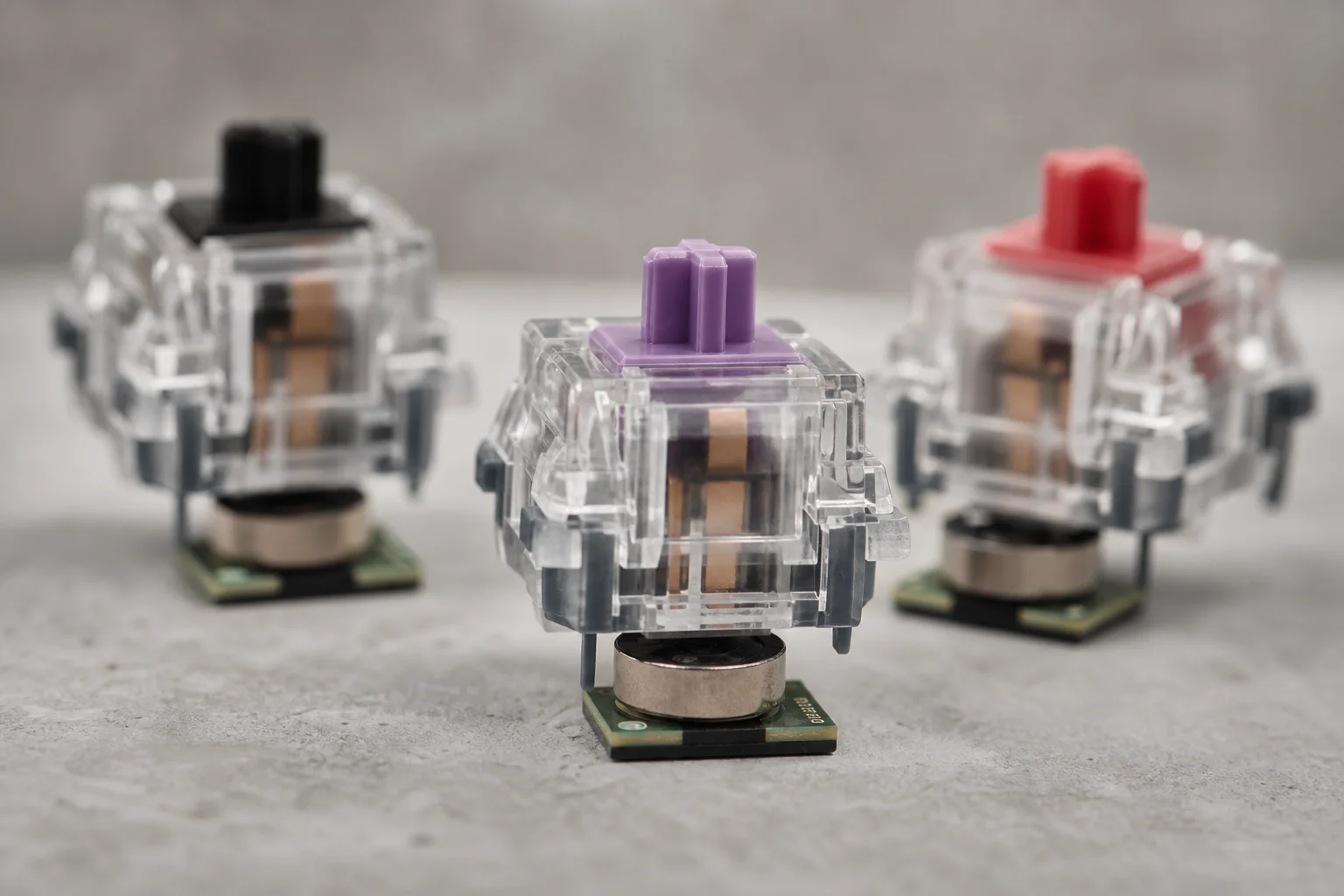 Close-up of mechanical keyboard switches showing magnetic sensor placement